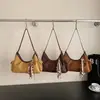 Bolso bandolera retro de nicho coreano tipo bolsa de albóndiga para mujer Otoño 2025 Nuevo Bolso de hombro cruzado moderno y simple de alta gama