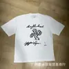 Travis Scott 26Ss Nuevo Estilo de Verano Calle Alta Americana Manga Corta Holgada Casual Nicho Camisetas Tops para Hombre y Mujer