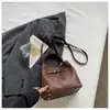Bolsa de Cesta Estilo Cesta Transfronteiriça para Mulheres, Nova Bolsa Versátil para Ombro e Transversal 2026, Bolsa de Mão de Nicho para Mulheres