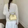 Bolso de cubo de mano simple y versátil para mujer, nuevo bolso de hombro de alta gama de moda 2026, bolso cruzado de gran capacidad para el día a día