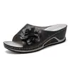 Pantuflas de talla grande transfronterizas para mujer 2021 nuevas de primavera y otoño sandalias casuales de cuña hueca flor de deseo zapatos de playa