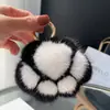 Pingente de Pelúcia Garra de Gato Simulação de Pelo de Coelho Rex Pingente de Bolsa Garra de Gato Chaveiro Criativo para Carro Boneco para Pendurar em Mochila de Casal