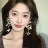 Mismo Estilo que Xiaohongshu ~ Aretes Largos Retro con Borlas de Pétalos Diseño Nicho Aretes Elegantes Cool y Exagerados
