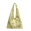 La nueva bolsa de axila de lona de nailon Henggeng con bordado de pájaros de nicho para mujer es una bolsa versátil, ligera, de secado rápido y de gran capacidad.
