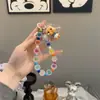 Bolsa Colgante para Teléfono con Cadena Cruzada de Cuentas de Colores de Niña Llorando Super Linda Estilo Ins Bolsas con Sentido de Diseño de Nicho Cadena para Teléfono