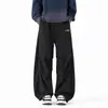 Pantalones largos casuales nuevos de otoño, pantalones de trabajo rectos holgados para hombre, pantalones paracaídas versátiles de secado rápido, blancos de moda