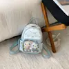 Mochila de Moda Fresca Elegante de Dibujos Animados 2026 para Mujeres, Bolso de Mano Pequeño Versátil Texturizado de Diseño de Nicho