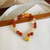 Pulsera Mezclada de Cristal Amarillo Torre Roja Ágata Roja para Mujer Diseño de Moda Nicho Nuevo Estilo Étnico Chino Pulsera de Bolsa de la Suerte Lingote