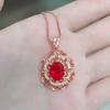 Tiktok en vivo venta caliente exquisito anillo de flor aretes colgantes collar cadena clavícula joyería de flor hueca de rubí