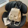 Mochila de Bolinhas Nicho Estilo Coreano para Mulheres 2026 Nova Tendência Moda Grande Capacidade Durável Versátil Mochila Pequena de Mão
