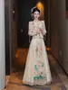 Color claro color champán Xiuhe 2025 nuevo nupcial spray dorado kimono vestido de brindis vestido de boda chino Xiuhe