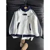Chamarra de cuello alto a rayas para hombre y mujer, otoño/primavera, estilo universitario, chamarra de corte limpio, casual holgada, top tipo chamarra de béisbol