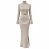 Vestido de Tricô Costurado com Fenda Lateral Europeu e Americano para Mulheres Vestido Costurado de Gola Alta Transfronteiriço Saia Longa Elástica para Mulheres