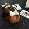 Bolso Cubo de Lana de Cordero Retro para Mujer 2026 Nuevo Bolso de Hombro Individual de Alta Calidad con Textura Mate Bolso Cruzado Casual para el Trabajo