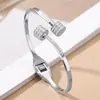 Pulsera de acero inoxidable de comercio exterior transfronteriza con incrustaciones completas de diamantes para mujer, estilo europeo y americano, pulsera de acero de titanio impermeable y que no pierde el color, disponible para venta al por mayor