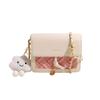 A bolsa de ombro popular deste ano, nova moda coreana primavera e verão, design de nicho, versátil, bolsa mensageira com corrente, bolsa pequena quadrada