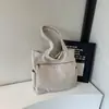 Bolsa de Lã Casual para o Dia a Dia de Grande Capacidade para Mulheres 2025 Nova Chegada Bolsa de Ombro Versátil Estilo Coreano Bolsa de Axila Bolsa Tote