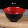 Tazón de melamina rojo y negro imitación porcelana plástico tazón negro y rojo suministro de tienda departamental de uno yuan dos yuanes mayoreo una generación de envío