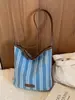 Bolsa de moda listrada de grande capacidade para mulheres 2026 nova bolsa tote de ombro casual moda executiva bolsa de balde tendência