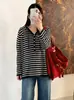 Suéter de punto a rayas con capucha versátil para mujer de talla grande 2026 otoño casual suelto para mujer de talla grande