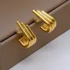 Pendientes de aro de línea multicapa de alta gama de venta caliente transfronterizos europeos y americanos Pendientes geométricos de oro de 18 quilates Joyería de estilo frío Venta al por mayor