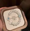 Elegante Pulsera de Lazos y Perlas Estilo Francés para Mujer, Temperamento de Socialité de Moda, Joyería Personalizada de Alta Gama