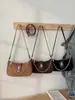 Bolso cruzado casual retro transfronterizo para mujer 2026 nuevo bolso cuadrado pequeño de moda para hombro o cruzado para mujer