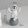 Muñeca decorativa creativa de astronauta caja sorpresa regalo muñeco de mano para niños adornos de escritorio de astronauta venta al por mayor