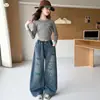 Jeans para niñas primavera/otoño 2026 nuevo estilo pantalones anchos elegantes para niños con solapa trasera, pantalones rectos de moda para niños mayores