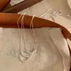 Colar Minimalista Coreano de Contas Redondas Dupla Camada Luxo Leve Corrente de Clavícula Nicho Corrente de Osso de Cobra Versátil de Alta Qualidade para Mulheres