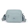 2026 Nova Bolsa Feminina de Cor Sólida Tendência Moda Cor Sólida Ombro Único Transversal Simples Bolsa Feminina de Nylon Casual Pequena Quadrada