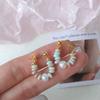Pendientes de cuentas coloridas para mujer, con borlas explosivas, únicos y distintivos, diseño de nicho, pendientes de lujo ligeros de alta moda.