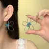 Brincos Maillard Retrô com Flor de Linha Olho de Tigre para Mulheres Celebridade da Internet Temperamento Estilo Cool Brincos de Tarraxa Novos Acessórios de Brinco Outono/Inverno