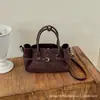 Bolsa de Camurça Estilo Coreano Feminina 2026 Outono/Inverno Nova Retro Bolsa de Ombro Único Sob o Braço de Alto Valor para Compras na Rua Bolsa de Mão