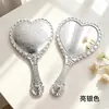 Espejo de mano para maquillaje portátil HD espejo de tocador electrochapado estilo palacio retro espejo con forma de corazón personalizable