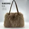 Bolsa de mano de pelo ecológica 2026, Bolso de mano de moda, Bolso bandolera con cremallera mullido, Venta al por mayor desde el fabricante, Bolso de felpa color crema