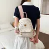 Mochila de mujer fresca y dulce, moderna y versátil, mochila con estampado de dibujos animados lindos, nuevo modelo 2026, bolso cruzado, bolso para el trabajo