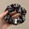 Elástico de cabelo com laço estampado de leopardo para mulheres, faixa de cabelo de luxo de alta qualidade, corda de cabelo para prender coque, elástico de cabelo, acessório de cabelo