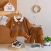 Conjunto de manga corta transfronterizo para niños, nuevo polo con solapa estilo universitario, conjunto de dos piezas moderno y elegante para bebés