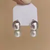 Pendientes para hombre con forma de estrella de amor cepillada esmerilada 2025 nuevo popular de lujo ligero alta gama pendientes con clip para oreja femenino nicho único