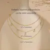 Collar de cuentas con colgante de circonita cúbica minimalista europeo y americano, en capas con cuentas doradas y cadena fina, collar de tres capas, elegante y con estilo