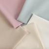 Verano liso liso liso liso traje traje pantalones tela tejida teñido elástico tela para falda JK al por mayor