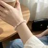 Chenmo Bracelete Pérola Degradê Retro de Luxo Discreto com Contas Moda Simples Versátil para Mulheres com Toque de Alto Padrão Atacado