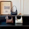 Bolsa de Ombro Simples de Nicho Feminina Nova de Alta Qualidade Versátil Bolsa de Mão Retro Casual Bolsa Bolinho Textura Trançada de Temperamento