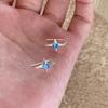 Pendientes de plata 925 con forma de estrella y cuatro agujas, estilo femenino, de estilo frío, con circonita azul, de alta gama para otoño e invierno.