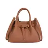 Bolso de mano texturizado de nicho transfronterizo, bolso tote pequeño para mujer, nuevo modelo 2026, bolso tipo cubo pequeño simple, bolso versátil de hombro y cruzado