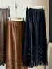 Saia Vintage de Camurça Vazada com Franjas para Mulheres, Novo Estilo Coreano de Outono Elástica de Cintura Alta Emagrecedora Comprimento Médio Linha A