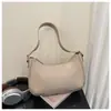 Bolso de mano vintage de alta gama para mujer, bolso de moda tipo dumpling 2025, bolso de hombro sencillo de alta gama.