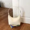 Bolso de axila con diseño de nicho estilo francés, nuevo modelo principios de otoño 2026, sensación de alta gama, bolso versátil casual para hombro y cruzado