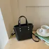 Bolso pequeño súper popular para mujer, nuevo patrón tejido de verano 2026, bolso de cubo para hombro y cruzado para el trabajo